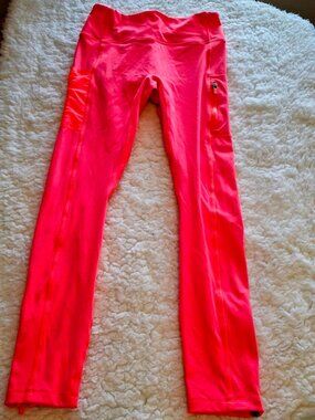 Fabletics Motion365 Bright Orange Leggings with Side Pockets – Size Small